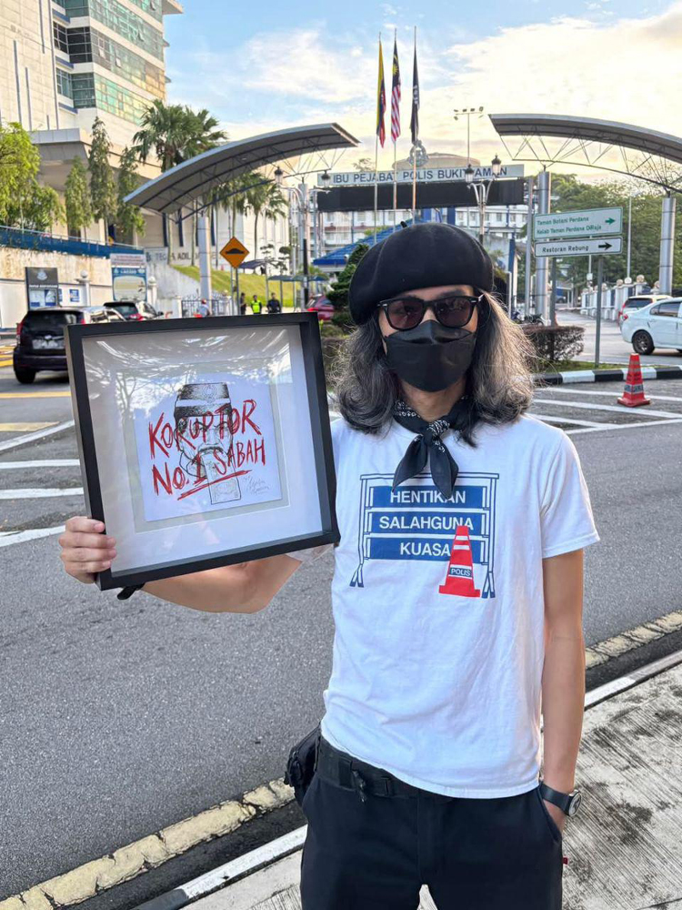 涉嫌上传政治讽刺漫画 法米惹扎警察总部录供